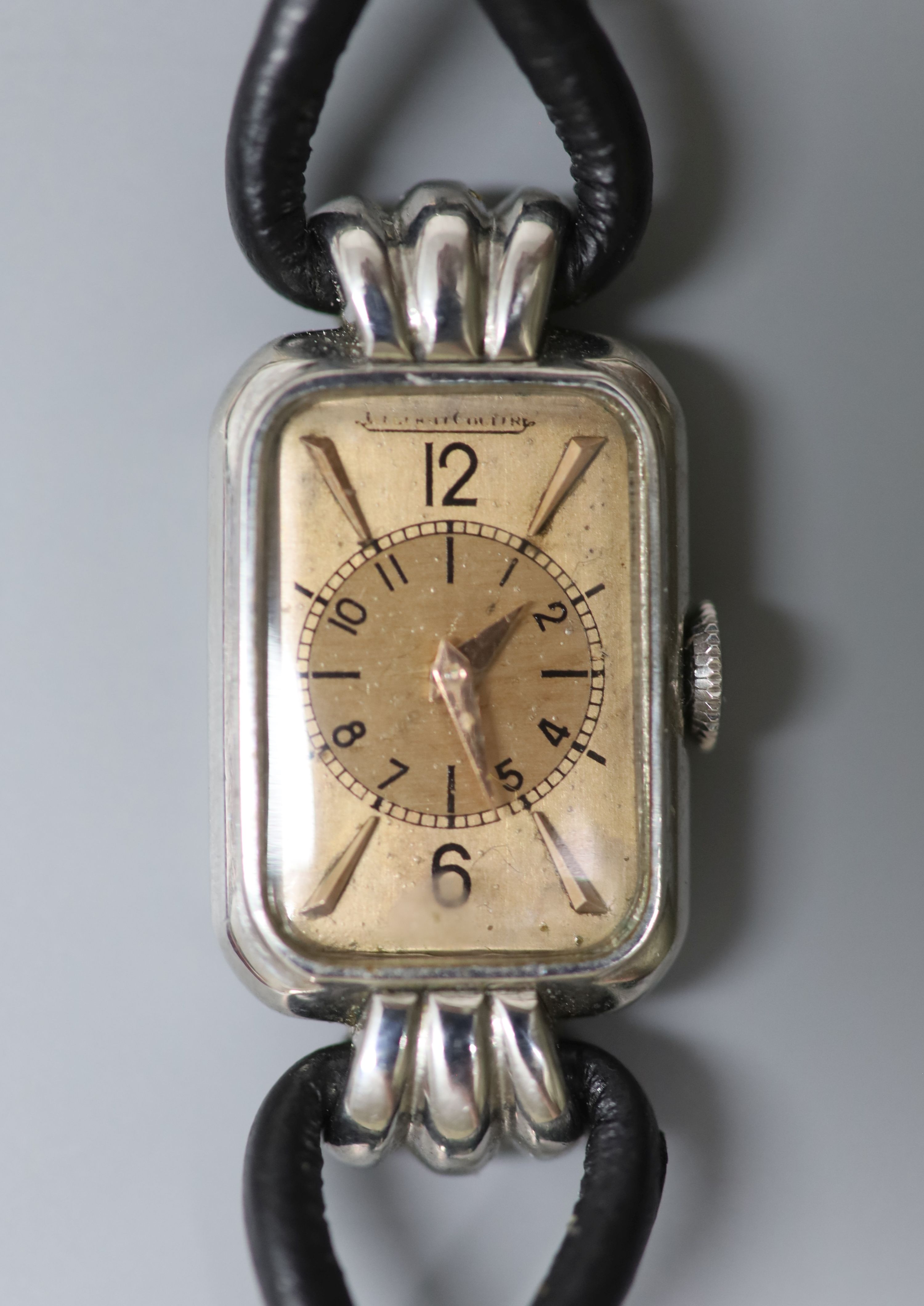 A lady's Art Deco stainless steel Jaeger LeCoultre rectangular dial wrist watch, on a fabric twin strand strap